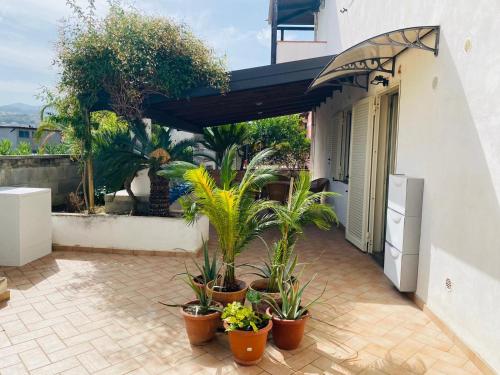 Accesso alla veranda esterna della casa vacanze